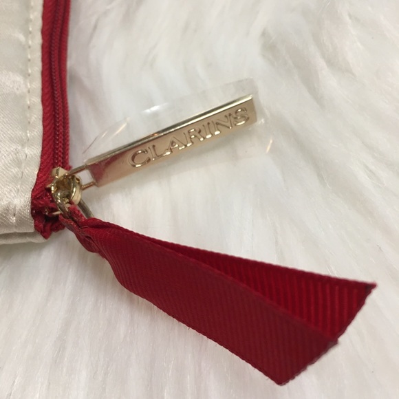 Clarins Paris | Lotions & Makeup Bag Set - Picture 6 of 12